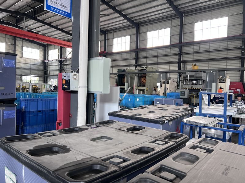 Assembly bench at a partner factory supplying private label cylinders